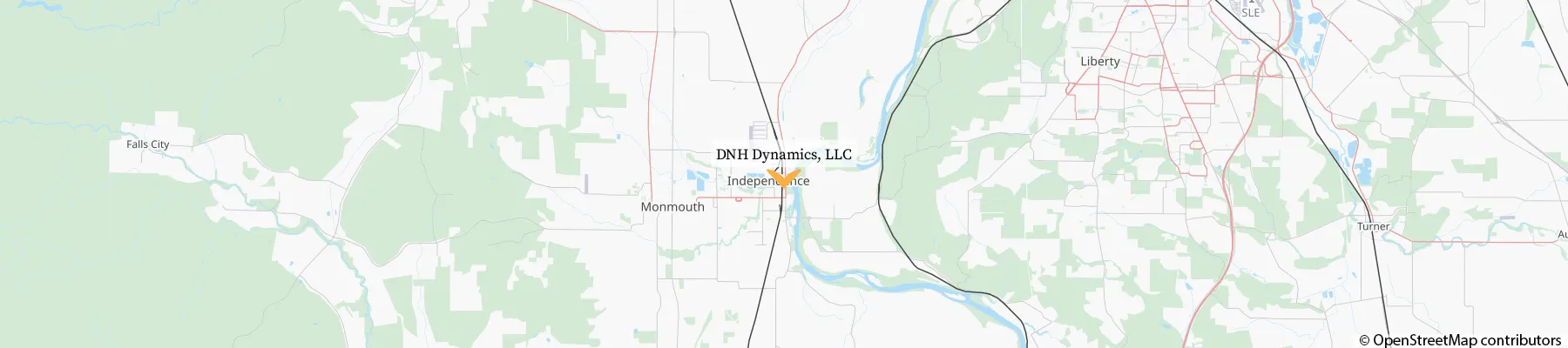 Photo of a map with a marker of DNH Dynamics, LLC, text above the marker that reads 'DNH Dynamics, LLC', and text on the bottom right corner that reads '© OpenStreetMap contributors'.